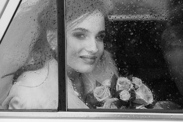 wedding. the bride behind the glass