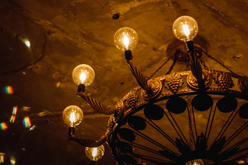 vintage chandelier with lamps