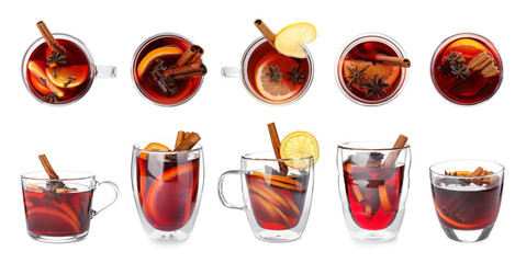 Set of traditional Christmas mulled wine in glasses on white background