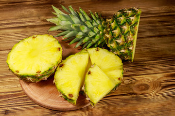 Fresh pineapple on wooden table