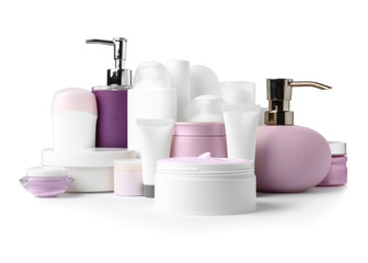 Different body care products on white background