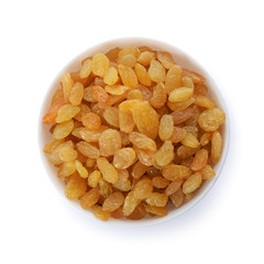 Bowl with dried golden raisins isolated on white, top view. Healthy nutrition with fruits