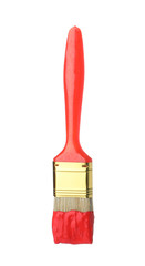 Brush with red paint on white background