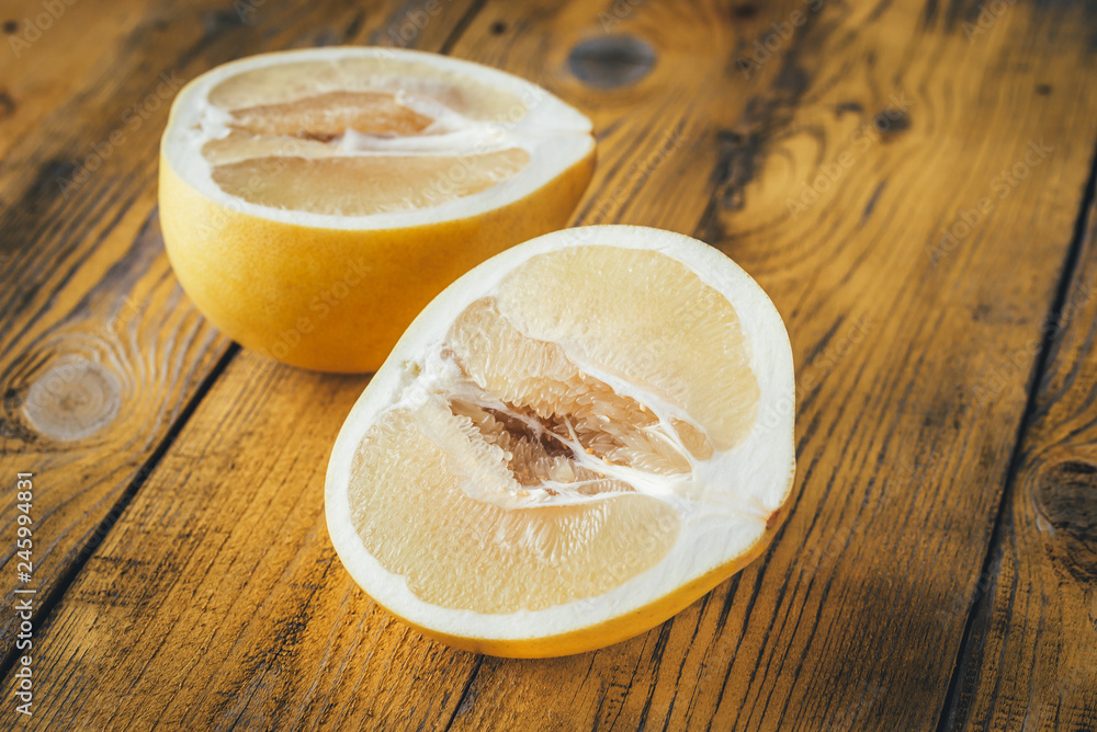 Sticker Pomelo on the wooden table