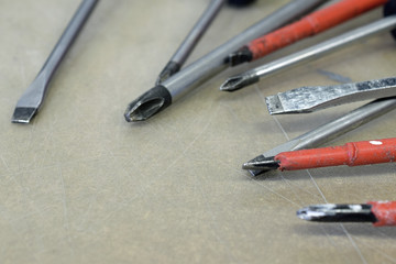 Used screwdrivers tips close up. Space for text.