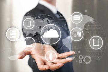 Businessman and  business illustration symbols on technology