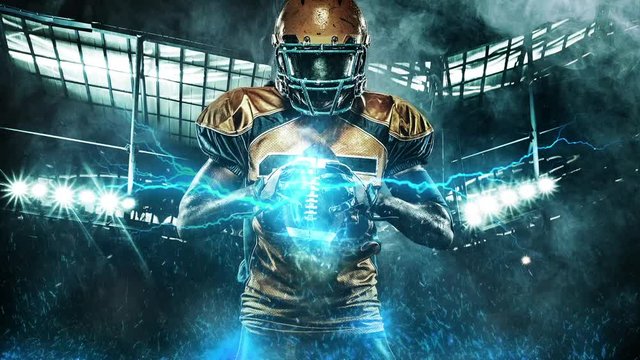 American football sportsman player on stadium with lights on background. Loop HD video.