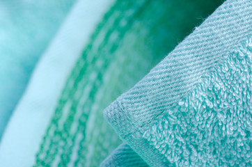 Green azure towel macro fabric material soft bath blur background