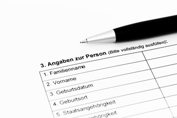 Fragebogen mit Kugelschreiber