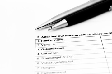 Fragebogen mit Kugelschreiber