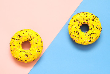Delicious donut on colorful background.
