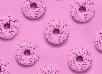 Abstract photo of pink donuts.
