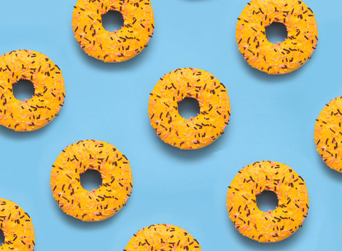 Delicious donut on colorful background.
