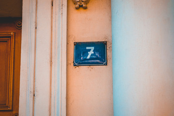 Number 7 sign on a building