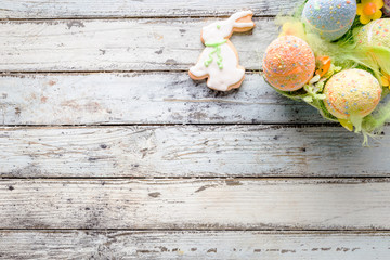 Easter homemade gingerbread cookie over white wooden table