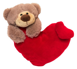 Toy bear with red heart isolated