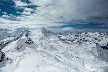 Fototapeta premium Winter view from the top of Kitzsteinhorn mountain, Kaprun ski resort, National Park Hohe Tauern, Austrian Alps, Europe.