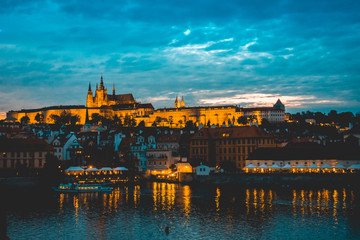 Prague and River Vitava illuminated at night