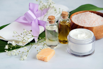 Spa natural skin care products background, cosmetic products - cream, oil and soap creative layout on white background