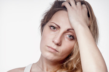 Naklejka premium Psychological portrait of sad and depressed woman. Pain, fear and hopelessness, body language, gesture concept.