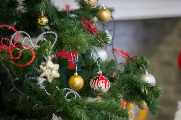 Fragment of a Christmas tree with toys.Christmas background