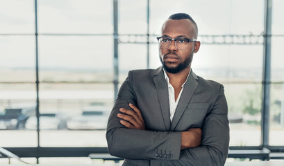 Portrait of a confident black businessman holding with his arms crossed