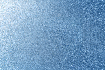 Metallic surface in blue tones. Urban textural background.