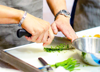 chopping green onion, Chef cutting fresh vegetables for cooking