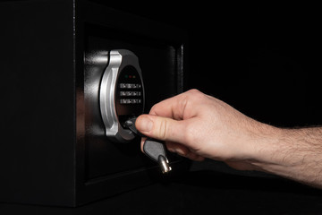 Naklejka premium Opening of safe 