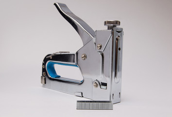 metal stapler for wood on a white background