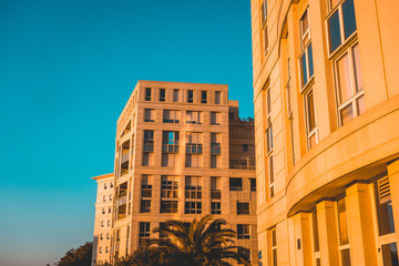 Fototapeta na wymiar Architectural apartment building in sunset light