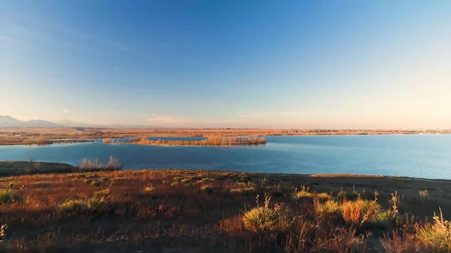 Low Flying Aerial of a Colorado Lake at Sunset