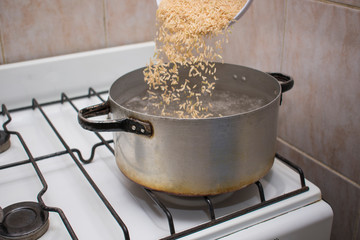 Cooking of brown rice.