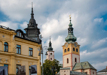 view on city castle and towers on the square in Banska Bystrica, Slovakia