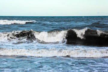 sea surface to the horizon with large waves with foam