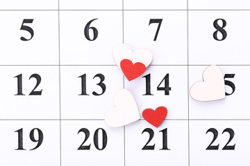 Valentine day calendar with wooden hearts