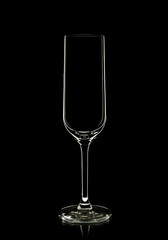 Empty glass champagne on black background. 