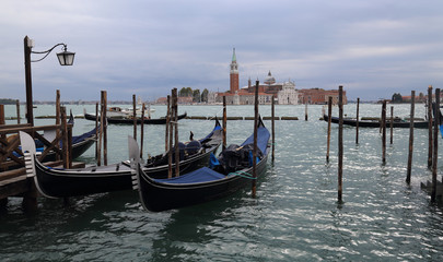 Gondolas and San Giorgio Maggiore island in Venice, Italy