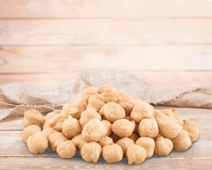 Heap of preserved chickpeas isolated on white background