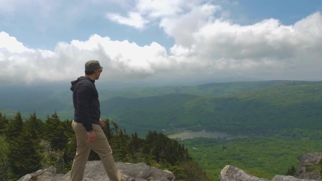 176 Man on top of a mountain victory
