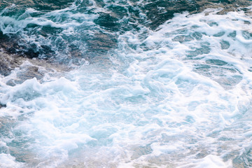 Fototapeta na wymiar Sea water foam, top view, abstract nature background.