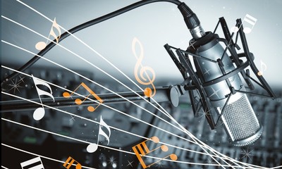 Microphone and  digital studio mixer  on background