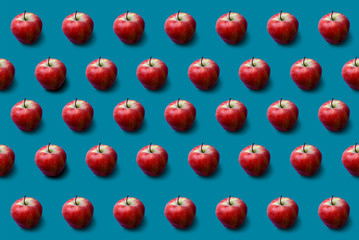 Apples pattern on blue background. Fresh. Nature.