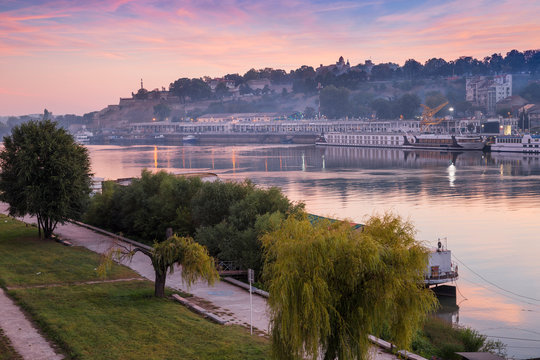 View of floating bars and nightclubs on Sava River across to Victor Monument at Belgrade Fortress, Belgrade, Serbia