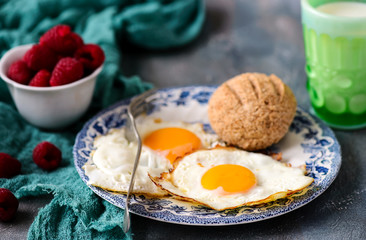 Breakfast  fried Eggs with buns and cheese