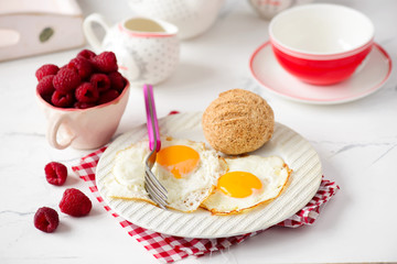 Breakfast  fried Eggs with buns and cheese