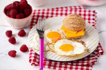 Breakfast  fried Eggs with buns and cheese