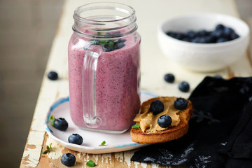 Blueberry smoothie and peanut butter toast