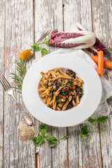 casarecce pasta with chicory chickpeas  sesame seeds and turmeric spice