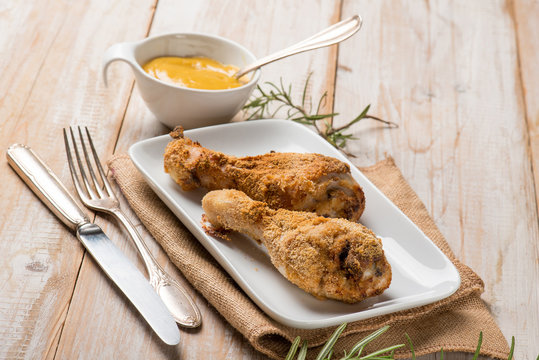 baked chicken legs with mustard and rosemary